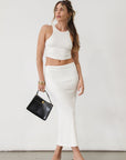 Textured ribbed knit cropped tank top. Racer back. Unlined. Textured ribbed knit maxi skirt. Elastic waist. Unlined. Basic set. white set. cream set. white skirt set. cream skirt set. summer outfit. cute summer outfit