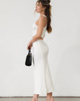 Textured ribbed knit cropped tank top. Racer back. Unlined. Textured ribbed knit maxi skirt. Elastic waist. Unlined. Basic set. white set. cream set. white skirt set. cream skirt set. summer outfit. cute summer outfit