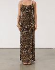 Animal printed knit maxi dress. Adjustable straps. Side slits. Unlined.
