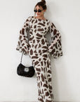 Printed chiffon maxi dress. Long bell sleeves. Adjustable crisscross back straps. Side slit. Fully lined. Dinner dress. Classy dinner dress. Fancy dinner dress. Nice dinner dress. Dressed up vacation outfits. Dress to wear on vacation. Nice dress to wear on vacation. Open back dress