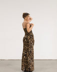 Animal printed knit maxi dress. Adjustable straps. Side slits. Unlined.