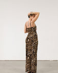 Animal printed knit maxi dress. Adjustable straps. Side slits. Unlined.