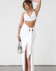 Knit maxi skirt. Knit top. Front keyhole with adjustable tie closure. Front slit. Fully lined. White dress set. White set to wear on vacation. Outfit to wear on vacation. Outfift to wear in Mexico. Mexico outfit. Beach outfit.