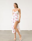 Floral printed satin maxi dress. Adjustable tie straps. Front slot. Adjustable back tie closures. Unlined for love and lemons dress. floral slip dress with lace detail and slit.