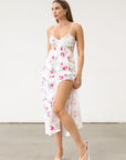 Floral printed satin maxi dress. Adjustable tie straps. Front slot. Adjustable back tie closures. Unlined for love and lemons dress. floral slip dress with lace detail and slit.