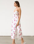 Floral printed satin maxi dress. Adjustable tie straps. Front slot. Adjustable back tie closures. Unlined for love and lemons dress. floral slip dress with lace detail and slit.