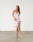 Floral printed satin maxi dress. Adjustable tie straps. Front slot. Adjustable back tie closures. Unlined for love and lemons dress. floral slip dress with lace detail and slit.