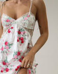 Floral printed satin maxi dress. Adjustable tie straps. Front slot. Adjustable back tie closures. Unlined for love and lemons dress. floral slip dress with lace detail and slit.