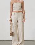 Woven wide leg pants. Hook and eye and zipper fly. Side pockets. Unlined. tan linen pants. linen pants. everyday throw on pants. business causal pants. vacation set. vacation outfit.