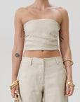 Woven tube top. Elastic smocked back. Fully lined. tan linen tube top. tan linen top. outfit to wear on vacation. minimal tube top. minimal top