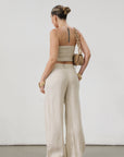Woven wide leg pants. Hook and eye and zipper fly. Side pockets. Unlined. tan linen pants. linen pants. everyday throw on pants. business causal pants. vacation set. vacation outfit.