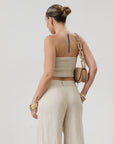Woven tube top. Elastic smocked back. Fully lined. tan linen tube top. tan linen top. outfit to wear on vacation. minimal tube top. minimal top