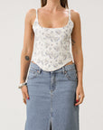 Floral printed woven bustier top. Fixed straps. Back hook and eye and zipper closures. Fully lined. White with blue floral top. Corset top.