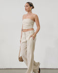 Woven wide leg pants. Hook and eye and zipper fly. Side pockets. Unlined. tan linen pants. linen pants. everyday throw on pants. business causal pants. vacation set. vacation outfit.