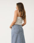 Floral printed woven bustier top. Fixed straps. Back hook and eye and zipper closures. Fully lined. White with blue floral top. Corset top.