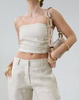 Woven tube top. Elastic smocked back. Fully lined. tan linen tube top. tan linen top. outfit to wear on vacation. minimal tube top. minimal top