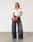 Knit Tube top. Strapless neckline. Front wire. Ruched bodice. Back cut out. Partially lined