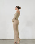 Textured open knit maxi dress. Elastic neckline. Off the shoulder long sleeves. Unlined. beach vacation dress. dress to wear to mexico. dress to wear to miami. beach vacation dress. tan knit dress. tan off the shoulder dress