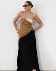 Colorblock woven maxi dress. Strapless neckline. Inner rubber grip lining. Back hook and eye and zipper closures. Fully lined. brown maxi dress.