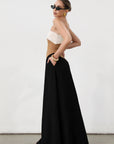 Colorblock woven maxi dress. Strapless neckline. Inner rubber grip lining. Back hook and eye and zipper closures. Fully lined. brown maxi dress.