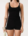 Ribbed knit tank top. Elastic neckline. Unlined. Basic tank top. Black basic tank top. Minimal tank top