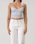Knit lace cropped tank top. Elastic straps. Elastic back neckline. Ribbed knit back panel. Unlined. Baby blue lace tank top.