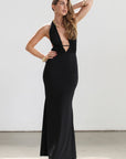 Knit maxi dress. Halter neckline. Back tie closure. Elastic back. Fully lined. Open back dress. Deep v dress. Black dress. Guest wedding dress.