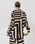 Printed woven shirt. Collar neckline. Long sleeves. Front button down closures. Side slits. Unlined. matching set. lounge set. throw on set. set for vacation.