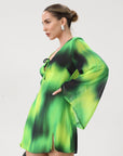 Chiffon dress. Long bell sleeves. V-neckline with tie closure. Front slit. Back hook and eye and zipper closures. Partially lined. green dress. beach vacation dress. green mini dress. mexico dress. miami dress. going out dress