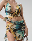 Knit mesh dress. Adjustable halter tie neck. Elastic waist. Ring detail. Side slit. Fully lined. Sexy mini dress. Tie dye mini dress. Dress with cutout. Miami dress. mexico dress. dresses to wear out