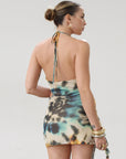 Knit mesh dress. Adjustable halter tie neck. Elastic waist. Ring detail. Side slit. Fully lined. Sexy mini dress. Tie dye mini dress. Dress with cutout. Miami dress. mexico dress. dresses to wear out