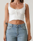 Knit crop tank. Fixed straps. Lace trim. Front tie detail. Back button down closures. Unlined. White tank top. Summer top.