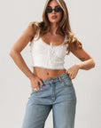 Knit crop tank. Fixed straps. Lace trim. Front tie detail. Back button down closures. Unlined. White tank top. Summer top.