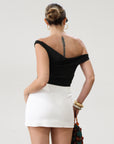 Knit crop top. Elastic straps. Ruched sides. Fully lined.. basic black top. going out top. black going out top. asymmetrical top. off the shoulder top