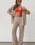 Open knit crochet pants. Elastic waistband. Unlined/sheer. Beach coverup. Pool coverup. Tan oat bottoms