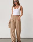 Woven wide leg pant. Hook and eye and zipper fly. Side pockets. Unlined. Tan pants. Office pants. Business casual pants. Business professional pants.