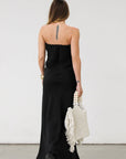 Linen woven maxi dress. Strapless neckline. Elastic back. Back zipper closure. Unlined. Black maxi dress. Black tie dress. Wedding guest dress.