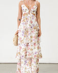 Floral printed eyelet woven tiered maxi dress. Adjustable straps. Front drawstring closure. Back cut out. Elastic back strap. Back hook and eye and zipper closures. Fully lined. Guest wedding dress. Floral dress. Coquette dress.