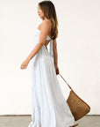 Crinkle woven maxi dress. Strapless neckline. Back tie closure. Elastic back waist. Fully lined. Baby blue maxi dress. Summer dress.