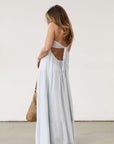 Crinkle woven maxi dress. Strapless neckline. Back tie closure. Elastic back waist. Fully lined. Baby blue maxi dress. Summer dress.
