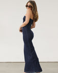 Stretch denim maxi dress. Folded strapless neckline. Back snap button and zipper closures. Back slit. Unlined. Brunch outfit. Summer maxi dress