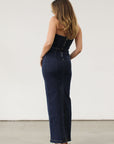 Stretch denim maxi dress. Folded strapless neckline. Back snap button and zipper closures. Back slit. Unlined. Brunch outfit. Summer maxi dress