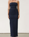 Stretch denim maxi dress. Folded strapless neckline. Back snap button and zipper closures. Back slit. Unlined. Brunch outfit. Summer maxi dress