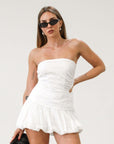 Eyelet woven skort. Side hook and eye and zipper closure. Bubble hem. Shorts lining. White eyelet skirt. White skort. Bubble skirt. Summer skirt.