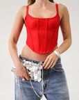 Knit lace bustier top. Adjustable straps. Boning in bodice. Back hook and eye closures. Fully lined. Going out top. Red tank top. Red bustier top. Red corset top.