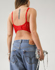 Knit lace bustier top. Adjustable straps. Boning in bodice. Back hook and eye closures. Fully lined. Going out top. Red tank top. Red bustier top. Red corset top.