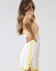 Satin dress. Lace trim. Adjustable straps. Back hook and eye and zipper closures. Unlined. Silk slip dress. Yellow slip dress. Slip dress with lace. Sexy dress. Yellow mini dress.