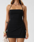 Knit top. Adjustable halter tie neck. Side slit. Unlined. Black top. Black halter tie top. Minimal top. Going out top. Side slit