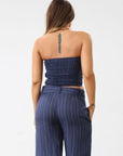 Striped woven top. Strapless side zipper closure. Elastic smocked back. Fully lined. Blue stripe tube top. Summer top. Tops to wear in summer. Tops to wear on vacation