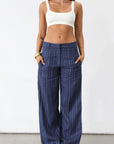 Striped woven wide leg pants. Hook and eye and zipper fly. Side pockets. Unlined. Business casual work pants. Slacks. Blue pants. blue slacks. blue stripe work pants.